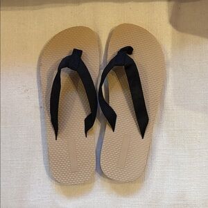 Tan Flip Flops with Black Straps